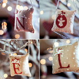 Coussins brodés NOËL