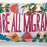 Coussin "We are all migrants"