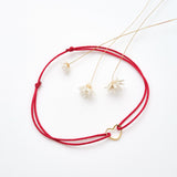 Bracelet coeur d'artichaut en coton caché dans une véritable coquille d'oeuf