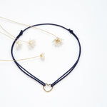 Bracelet coeur d'artichaut en coton caché dans une véritable coquille d'oeuf