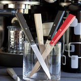 Set de 4 couteaux de table Opinel – manches en bois coloré pour une touche élégante et pratique à votre table.
