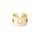 Bague audacieuse alliant le glamour des œillets dorés à la délicatesse de l'argent. Bague eyelet Bangle up