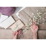 Branche papier et bouton blanc